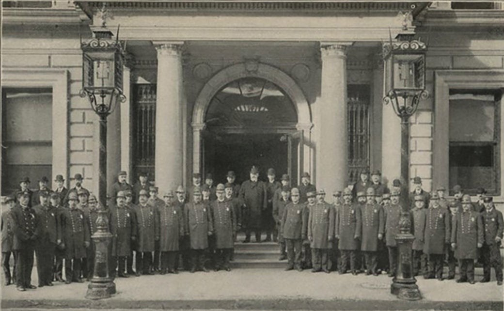 ASPCA agents gathered for a picture outside of the ASPCA headquarters in 1905.