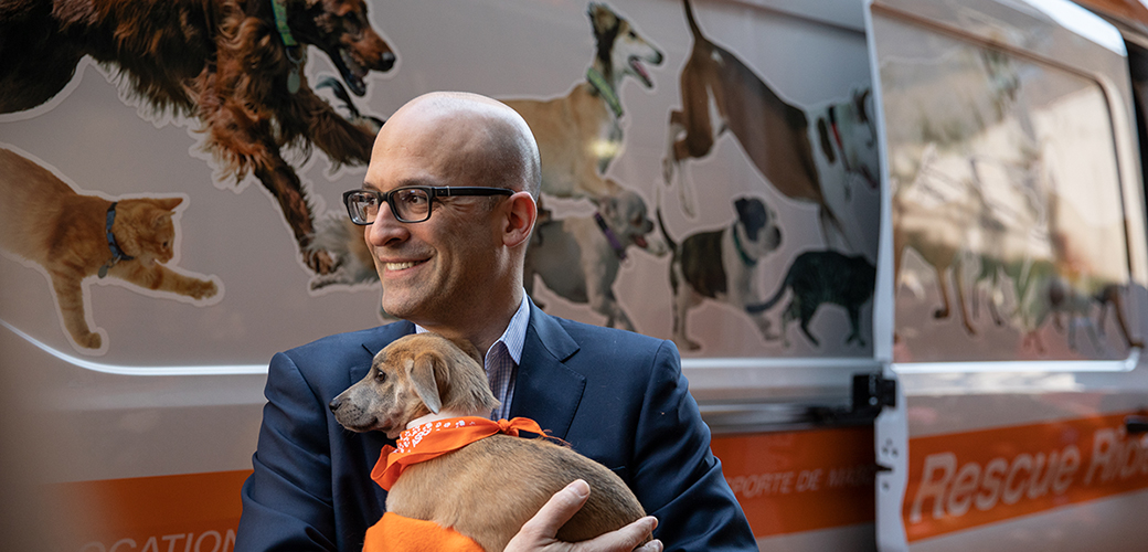 Matt Bershadker holding a puppy