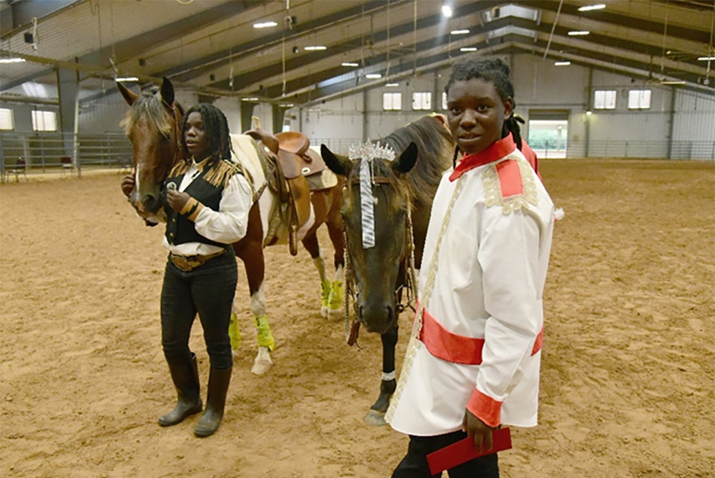 Angelica and Abigail with their horses