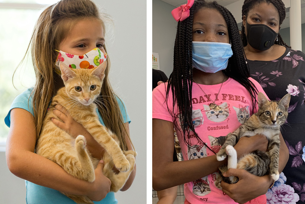 young adopters holding kittens