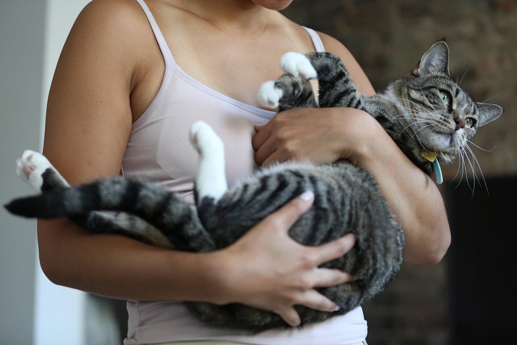 Melissa holding piglet