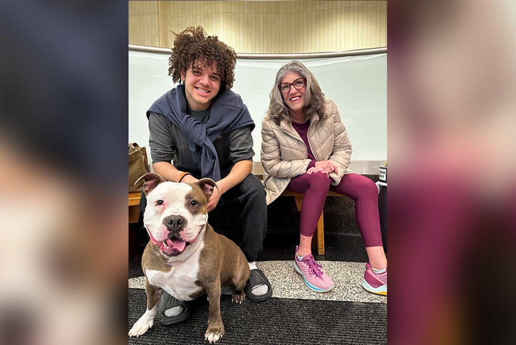 Hayden and Leigh with Potato on adoption day.