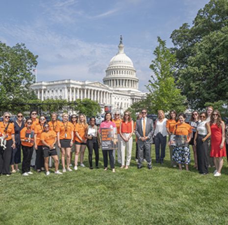 Howl to the Hill: Event Brings Advocates Together in Support of Goldie’s Act - standing together with the U.S. Capitol in the background